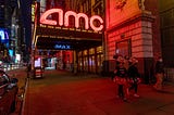 Why Is AMC Buying Gold?