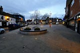 Aylesbury’s Kingsbury Square, also deserted. Its fountains are still running, and its lights are on, but nobody is around.