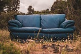 image ID: a blue couch outside