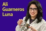Ali Guarneros Luna photo holding a cubesat and her name written in yellow with a purple background.