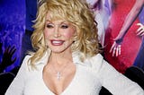How Much Longer Will We Joke About Dolly Parton’s Breasts?