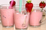 Strawberry milk shake with banana and ice cream