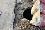 Manhole at First Pedro bus stop, Apapa-Oworonshoki Expressway