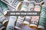 rolls of american dollar bills. title reads 2020 mid year checkin.