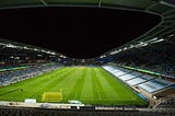 A picture of Allianz Field. A banner reading ‘George Floyd, 8:46’ is visible.