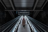 woman walking up a steep flight of stairs