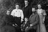 The author’s ancestors in a black and white photograph taken as a seated portrait.