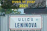 An original street name plate saying “Lenin Street” captured in EU in year 2021.