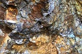 Close-up view of copper-rich ore at the Paikhel Copper Deposit, showcasing the visible mineral veins that highlight the high-quality copper content in this significant deposit.