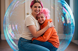 Mom and daughter with pink hair inside a blue bubble