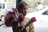 The girl selling roses.