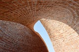 Twisted Brick Shell Concept Library: A Fusion of Traditional Materials and Modern Design by HCCH…