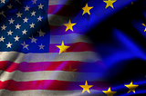 overlapping American and EU flag