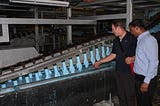 Eagle Protect CEO inspecting nitrile glove manufacturing line