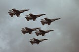 A picture of six fighter jets.
