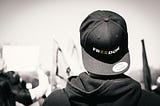 Person wearing a cap that says “freedom” in a rally in front of the White House in Washington, D.C.