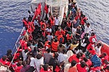 Almost 100 migrants rescued off Libya, 20 missing