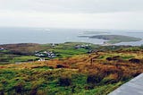 An expanse of Irish farmland jutting into the sea.
