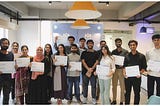 Group photo of Interns holding Completion Certificate with Umer Farooq, CTO MRS Technologies | MRS Summer Internship Program 2023.