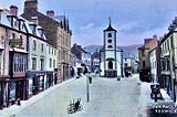 Old photograph of Keswick town centre showing the town hall, taken some time in the early 1900s.