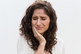 What Risks Are Associated with Pulling an Abscessed Tooth Without Proper Dental Care?