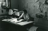 Jeremy Griffith at his work desk in 1982