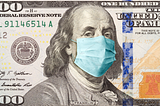 100 dollar bill covered in covid-19 face mask