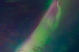 Aurora Borealis photo green and purple swirls