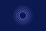 A series of concentric indigo circles stacked on top of one another