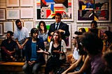 Woman speaking during a Q&A at an event