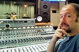 Hogan Torah sits infront of a sound board
