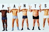 Men wearing pants holding signs with letters spelling pants.