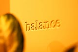 The word Balance fading out of focus to the right in soft light.