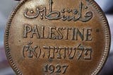 Why was The Hebrew language used in the old Palestinian currency?