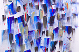 Abstract painting by the author. Blue, black, white and gold brush strokes with drips and splashes of bright red and grey fog