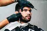 Man taking beard shave