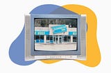 A TV showing a fuzzy image of a Blockbuster store.
