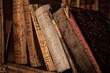 A shelf of old books.