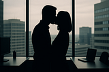 Image shows the silhouettes of a man and a woman kissing in an office.