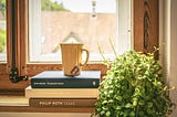 Image of tea on books