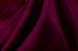 purple textile on white textile