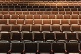 Empty auditorium chairs
