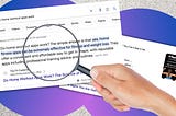 A hand holding a magnifying glass over a featured snippet on Google