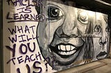Photo of BLM mural about racism.