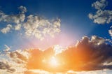 Sun rays bursting through the clouds