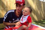 Photo of Daunte Wright with his child celebrating their first birthday.