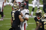 Brees and Brady greet following a Week 1 win in New Orleans, 34–23