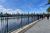 A sunny day and a view of the midtown skyline in NYC from the Reservoir