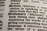 A close up of a dictionary definition page.