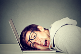 head on laptop